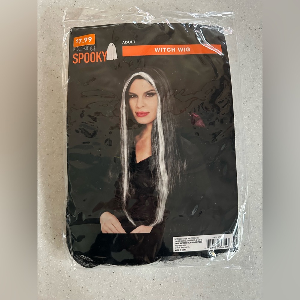New in Package Halloween Witch Wig. Adult Size. Black & Gray.